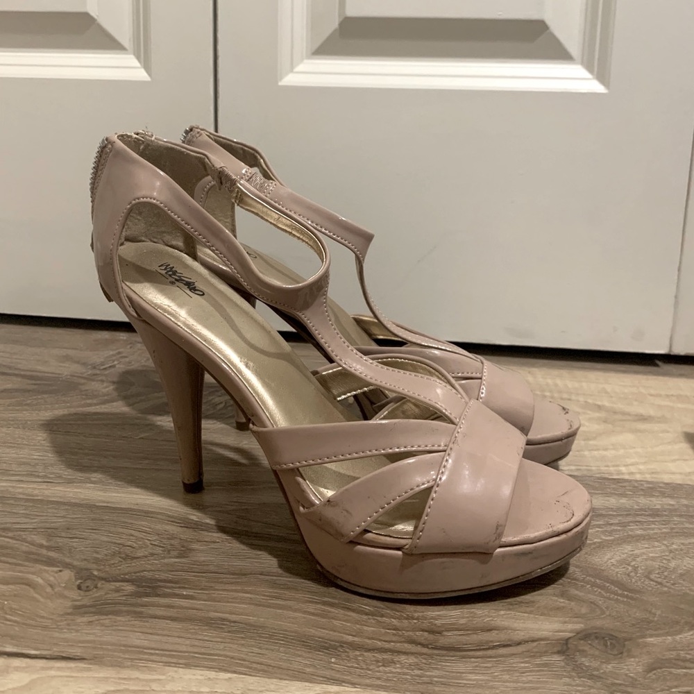 Nude patent strapped heels